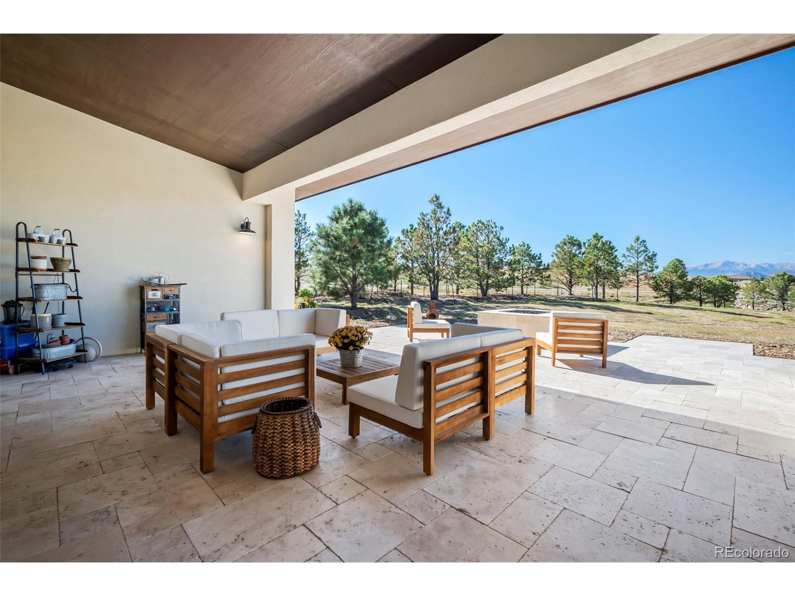 4694 Settlers Ridge Road Colorado Springs, CO 80908 - Photo 16 of 43 a living room with furniture and a large window