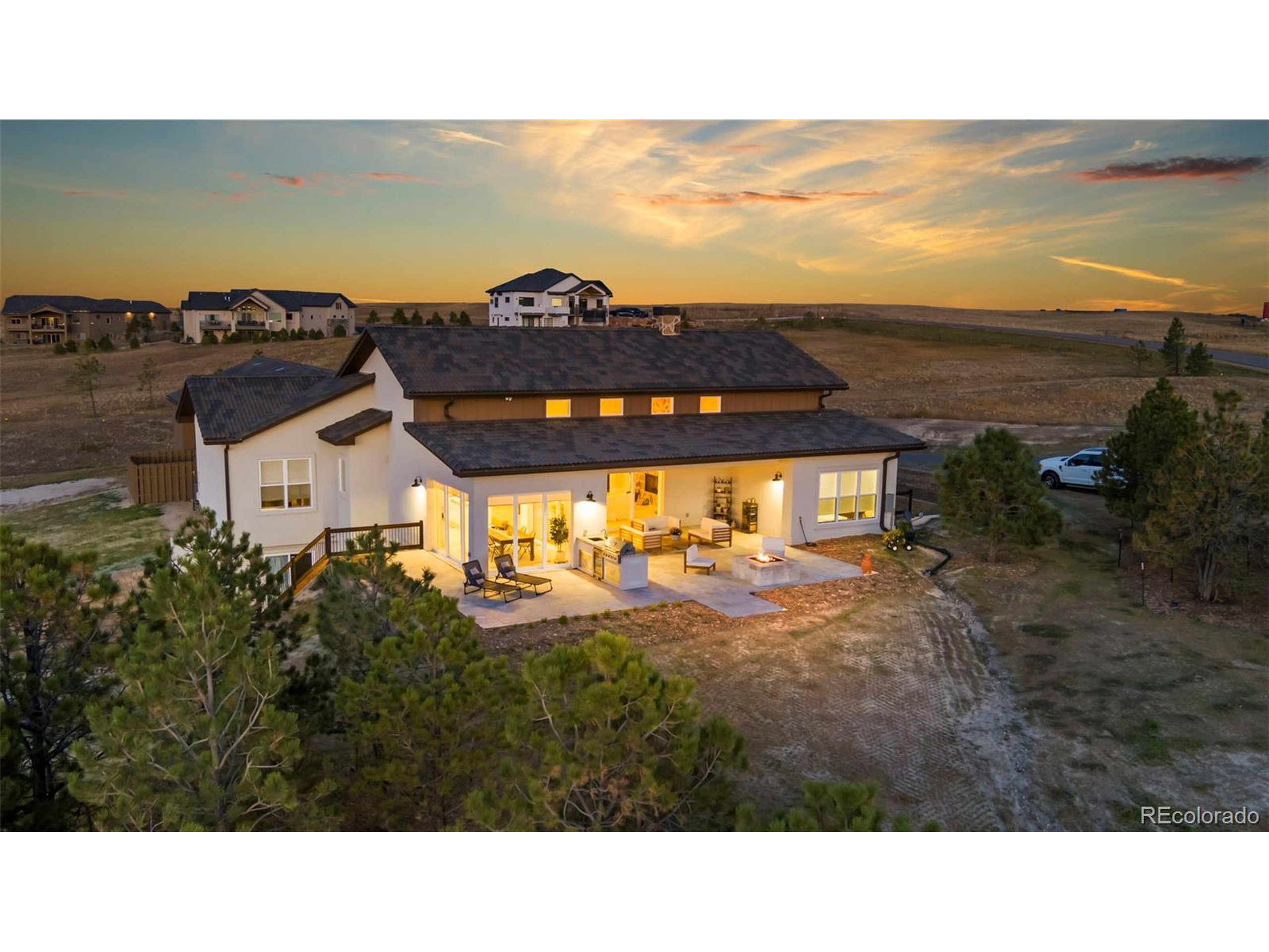 4694 Settlers Ridge Road Colorado Springs, CO 80908 - Photo 42 of 43 a view of a terrace with a garden