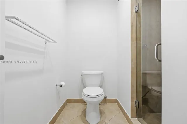 a view of a swimming pool with lounge chairs