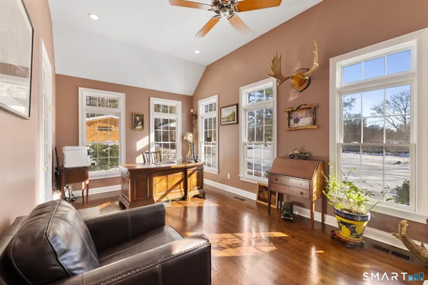 a living room with furniture and a window