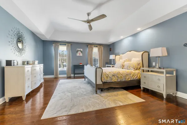 a bed room with a bed and a dresser