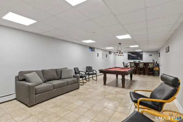 a living room with furniture a table and a couch