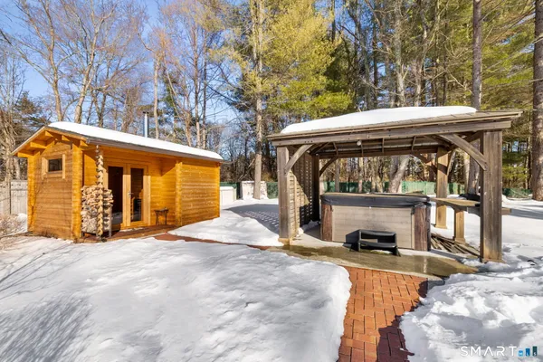 a view of outdoor space with deck and barbeque oven