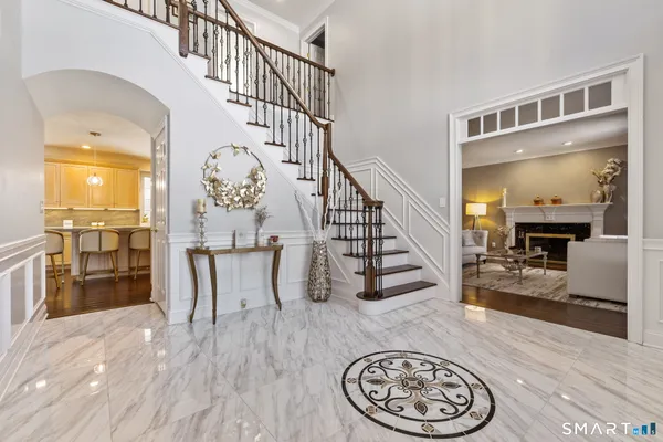 a view of a living room and wooden floor