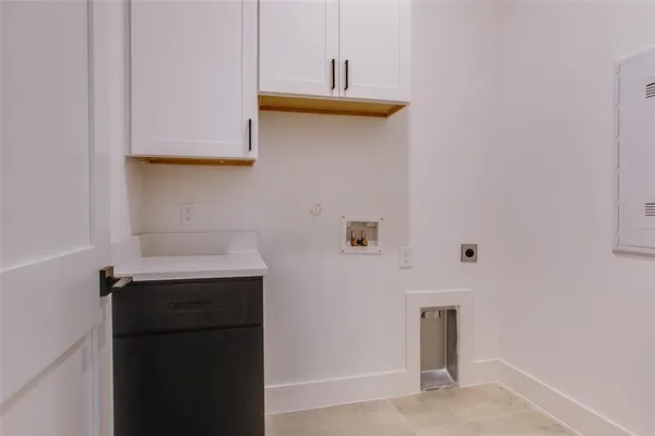 a kitchen with stainless steel appliances a refrigerator and cabinets
