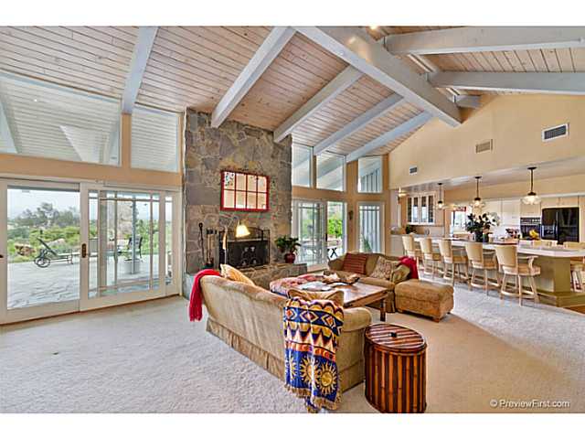 530 Georgine Road Fallbrook, CA 92028 - Photo 7 of 25 Raised stone hearth at fireplace, vaulted ceiling, French doors to patios.