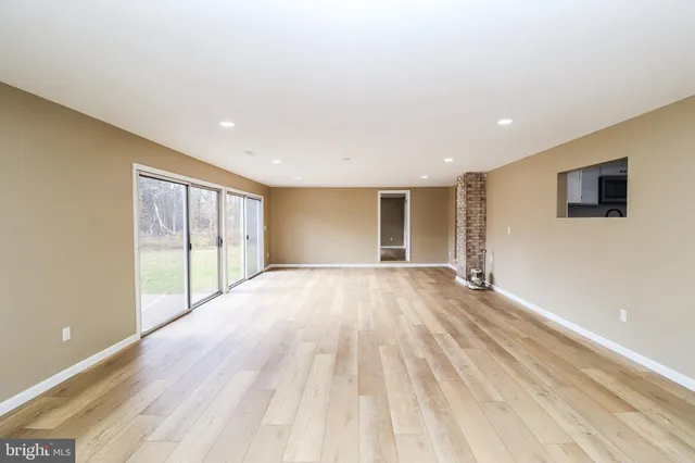 a bathroom with a sink a mirror and a vanity