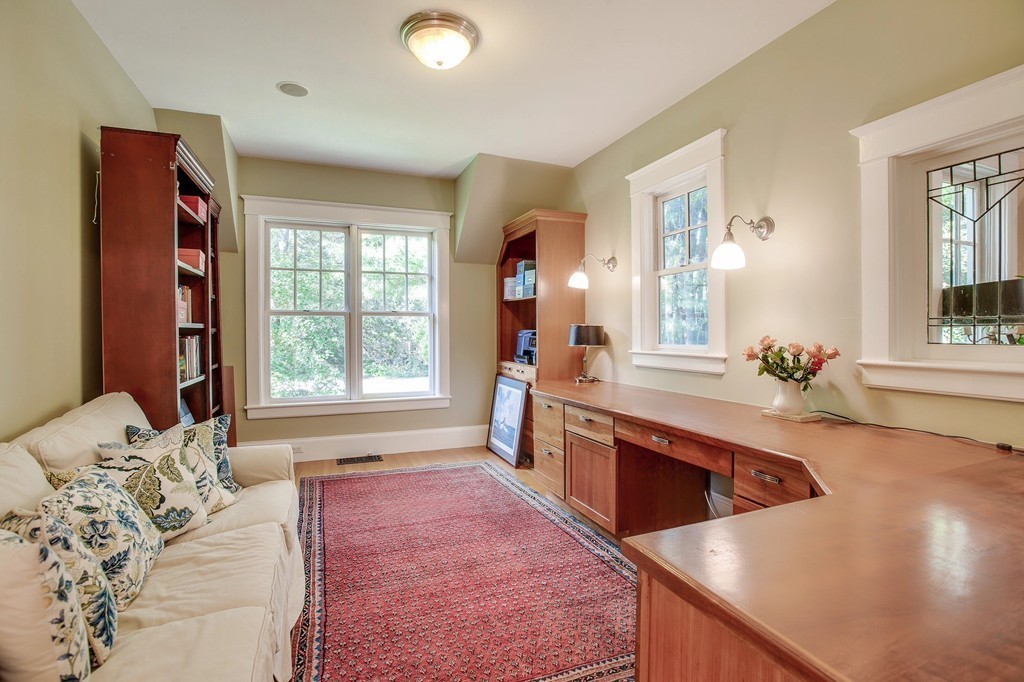 73 Weston Road Lincoln, MA 01773 - Photo 15 of 30 a spacious bedroom with a large bed and a large window