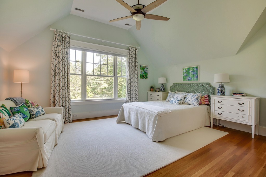 73 Weston Road Lincoln, MA 01773 - Photo 17 of 30 a bedroom with a bed and a couch