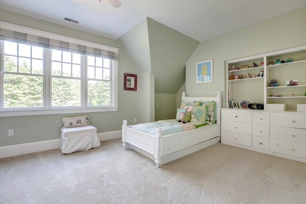 73 Weston Road Lincoln, MA 01773 - Photo 20 of 30 a room with a bed and window