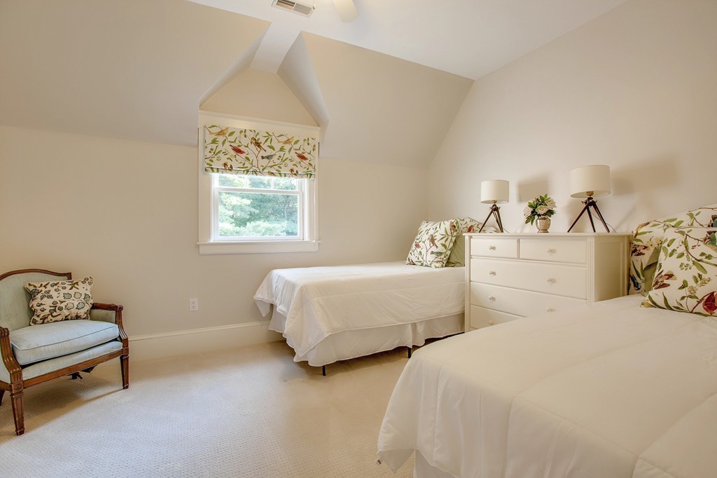 73 Weston Road Lincoln, MA 01773 - Photo 21 of 30 a bedroom with two beds and painting on the wall