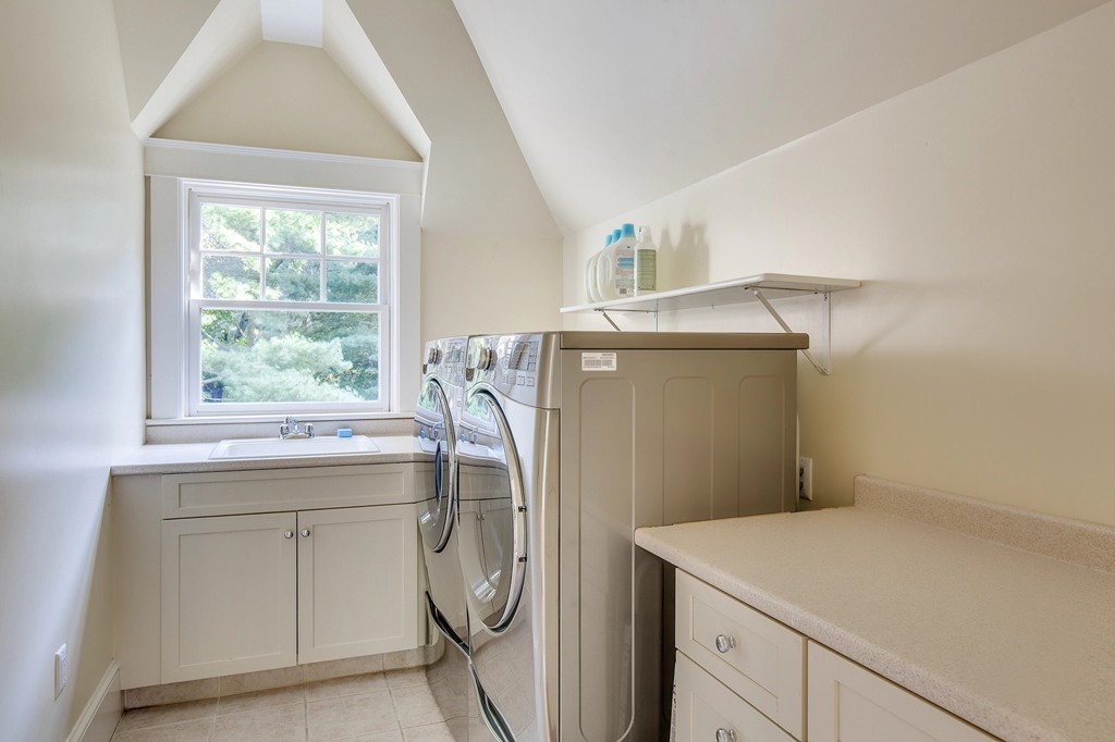 73 Weston Road Lincoln, MA 01773 - Photo 24 of 30 a utility room with dryer and washer