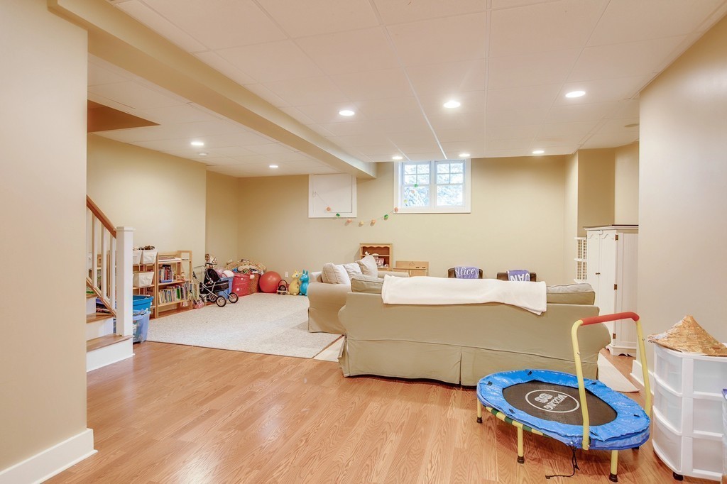 73 Weston Road Lincoln, MA 01773 - Photo 25 of 30 a view of a kitchen with furniture and a wooden floor
