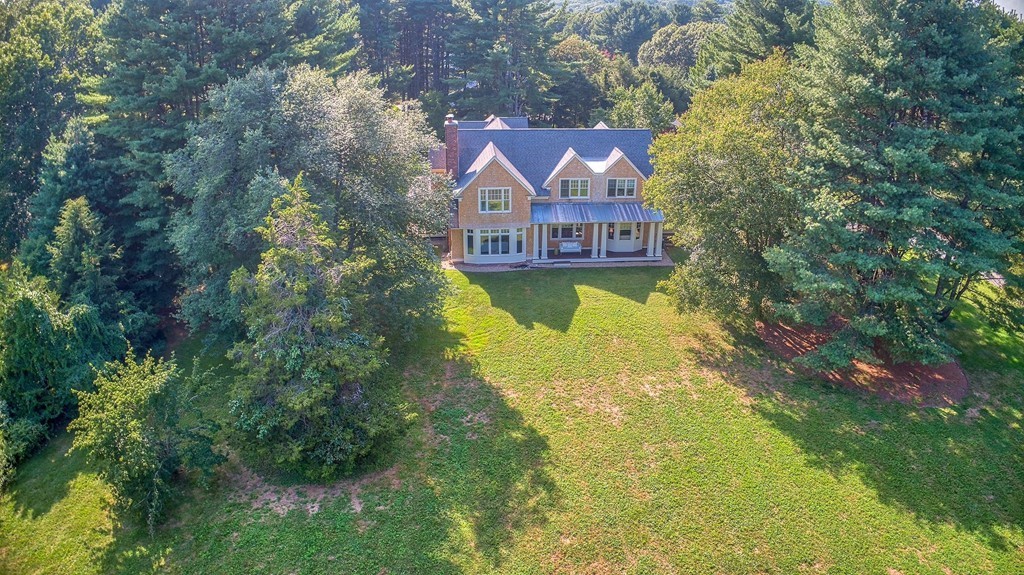 73 Weston Road Lincoln, MA 01773 - Photo 29 of 30 a view of a house with swimming pool next to a yard