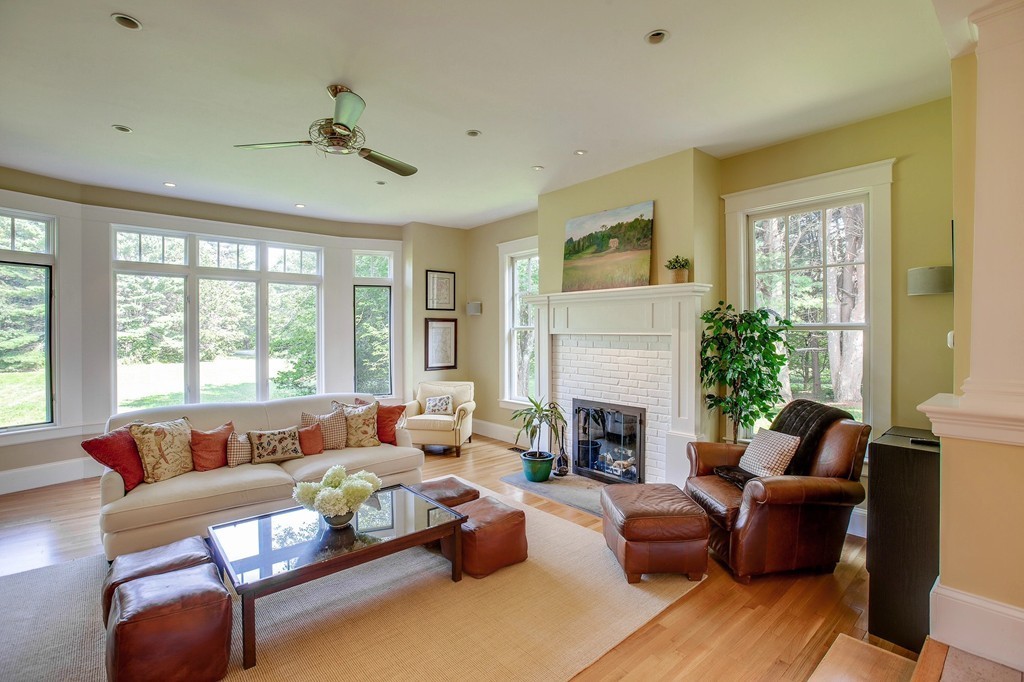 73 Weston Road Lincoln, MA 01773 - Photo 9 of 30 a living room with furniture and a fireplace