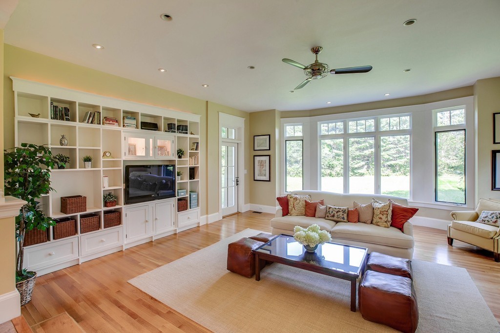 73 Weston Road Lincoln, MA 01773 - Photo 10 of 30 a living room with furniture and a large window