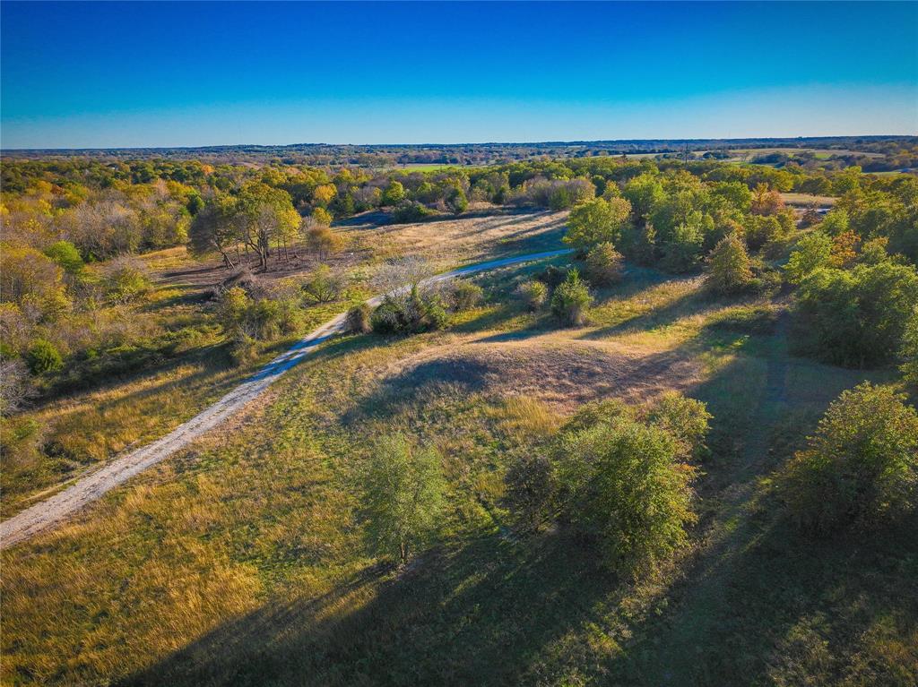 4 Lazy E Road St. Jo, TX 76265 - Photo 8 of 21 a view of a lake and outdoor space