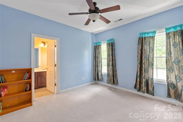 an empty room with a empty space and a window