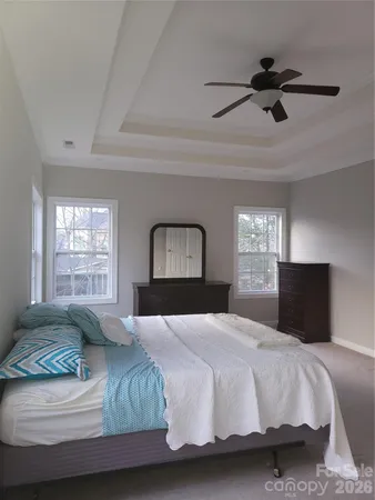 a view of a livingroom with windows