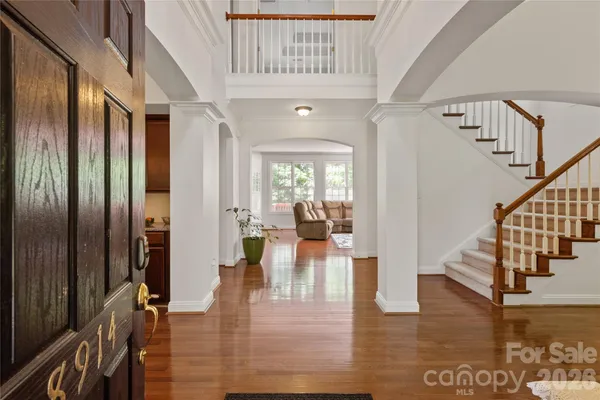 a view of a hallway with a kitchen