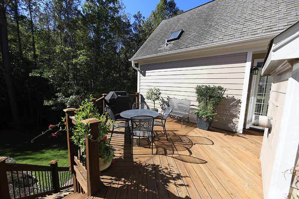 9509 Swepstone Lane Raleigh, NC 27615 - Photo 25 of 30 Enjoy the sunlight on your back deck off the Kitchen, Family Room or Master Bedroom. Deck