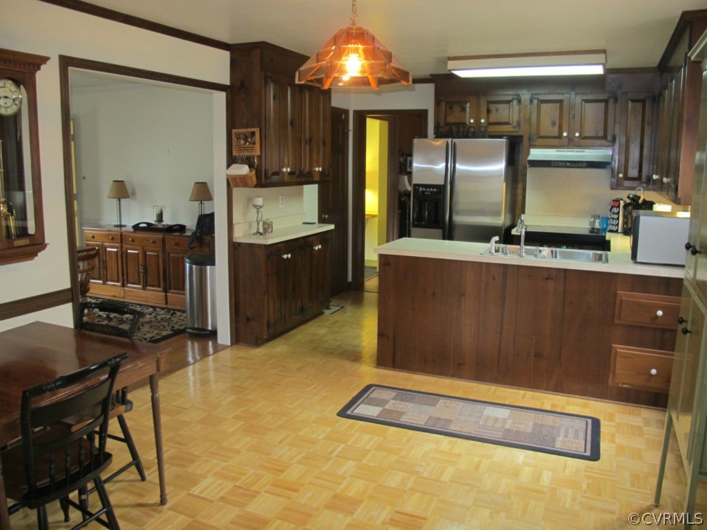 3815 Cresthill Road Chester, VA 23831 - Photo 14 of 24 a kitchen with stainless steel appliances granite countertop a stove refrigerator and cabinets
