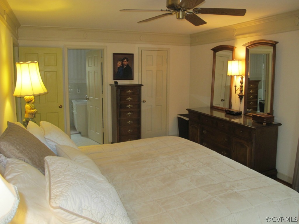 3815 Cresthill Road Chester, VA 23831 - Photo 16 of 24 a bedroom with a bed and a dresser