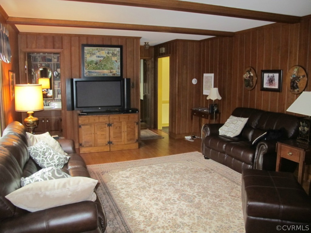 3815 Cresthill Road Chester, VA 23831 - Photo 6 of 24 a living room with furniture and a flat screen tv