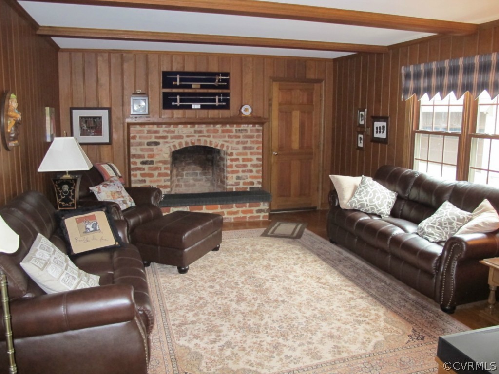 3815 Cresthill Road Chester, VA 23831 - Photo 7 of 24 a living room with furniture and a fireplace