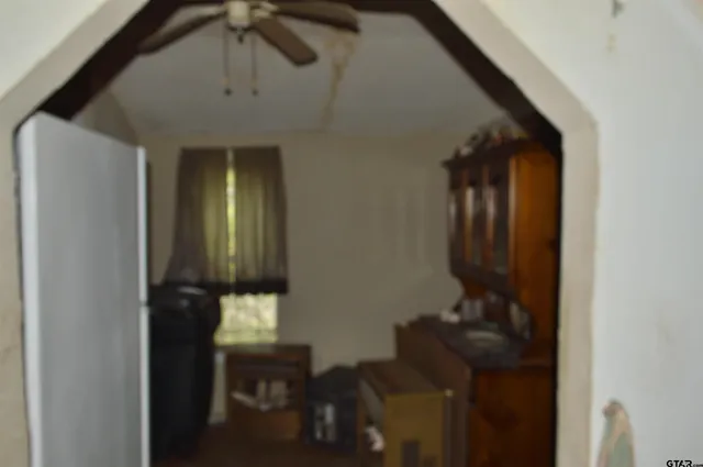a view of a house with a yard and plants