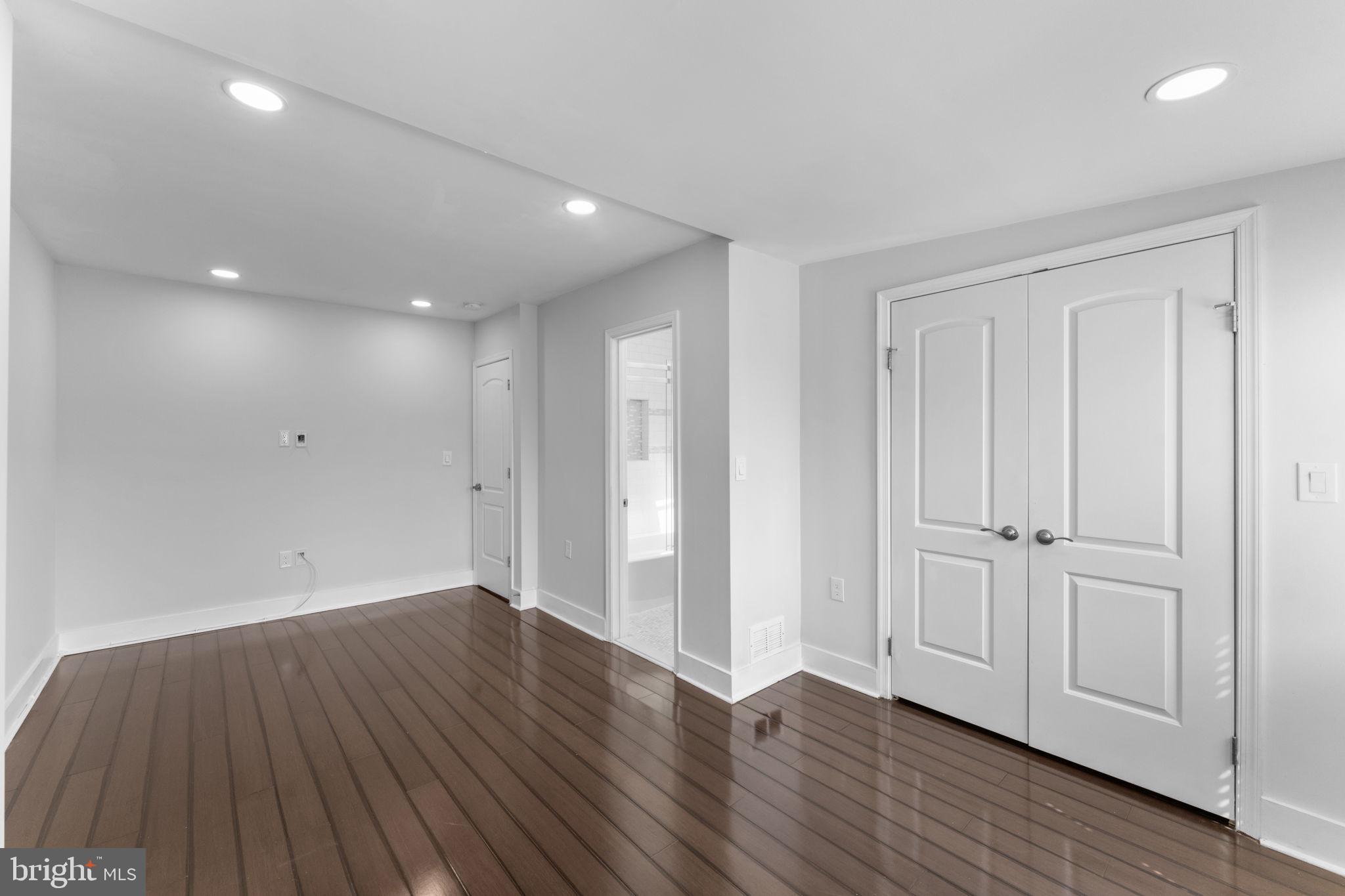 5209 5th Street Northwest Washington, DC 20011 - Photo 20 of 47 a view of an empty room with wooden floor