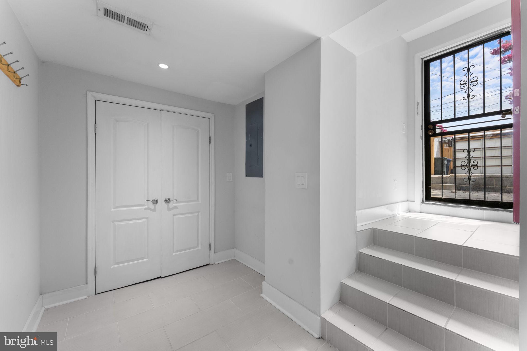 5209 5th Street Northwest Washington, DC 20011 - Photo 37 of 47 a view of an entryway with wooden floor