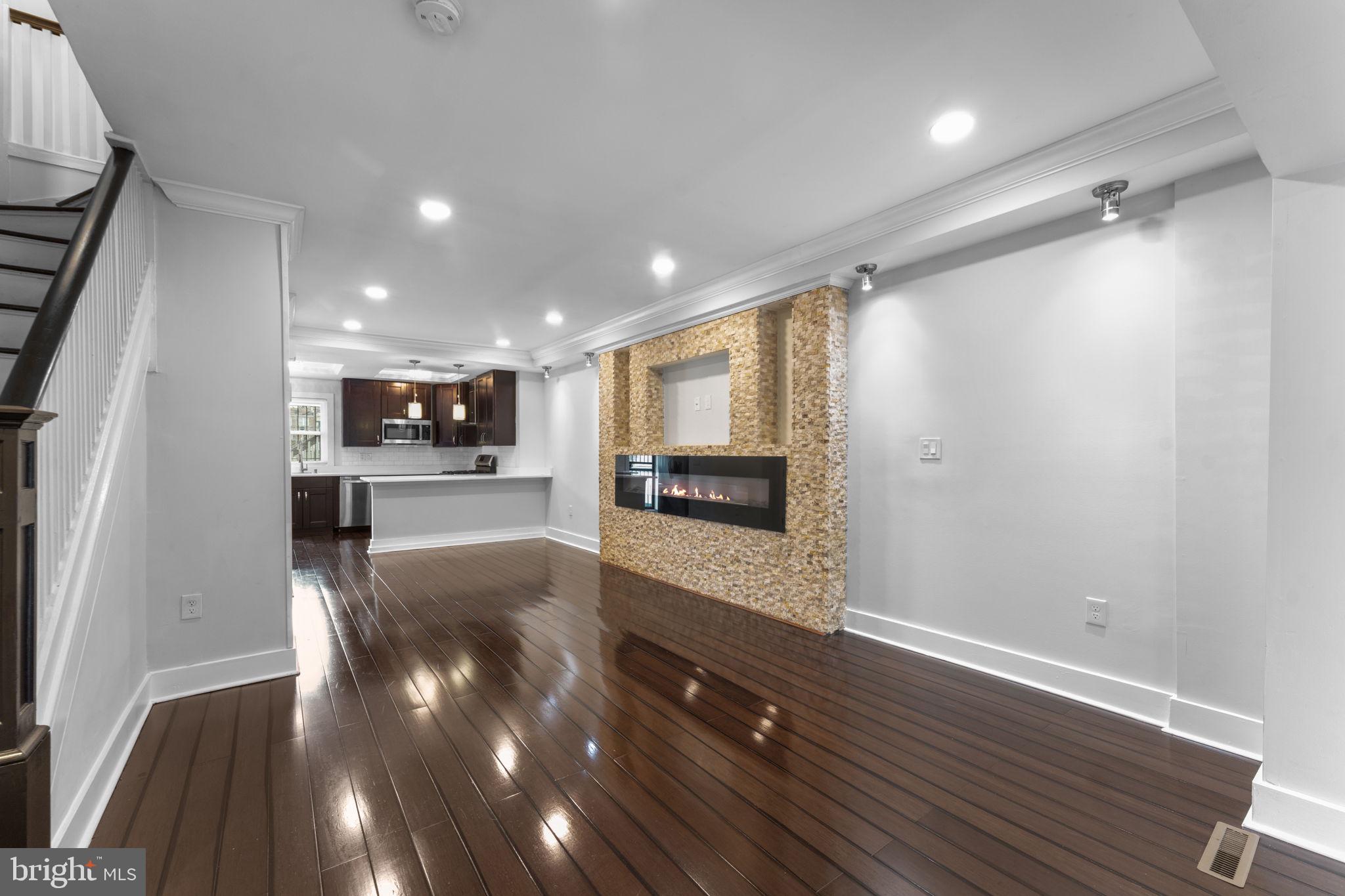 5209 5th Street Northwest Washington, DC 20011 - Photo 8 of 47 a view of kitchen with cabinets and wooden floor