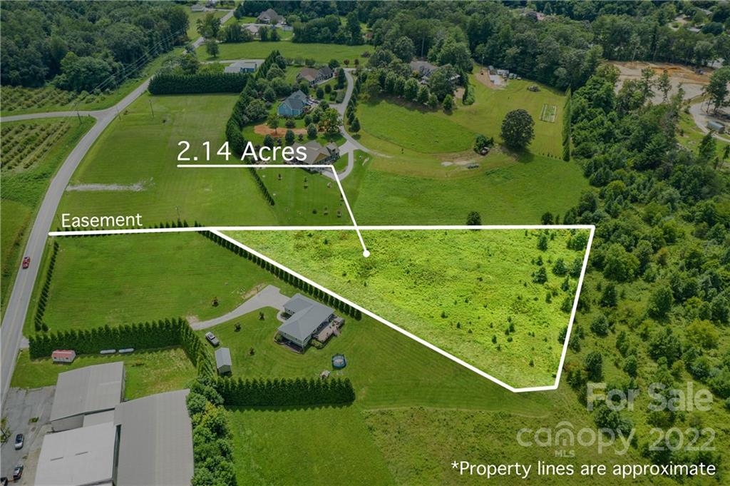 1181 Ridge Road Hendersonville, NC 28792 - Photo 1 of 9 a view of a tennis court