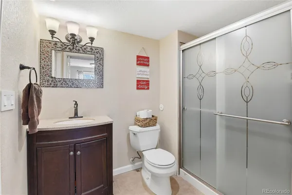 a kitchen with stainless steel appliances kitchen island granite countertop a sink and cabinets