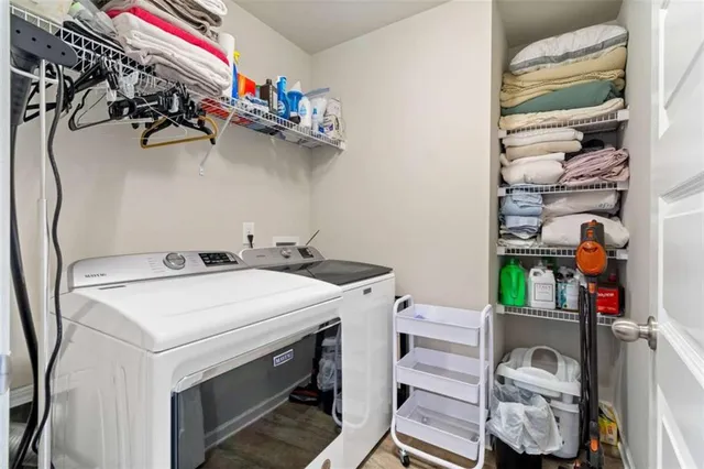 a utility room with dryer and washer