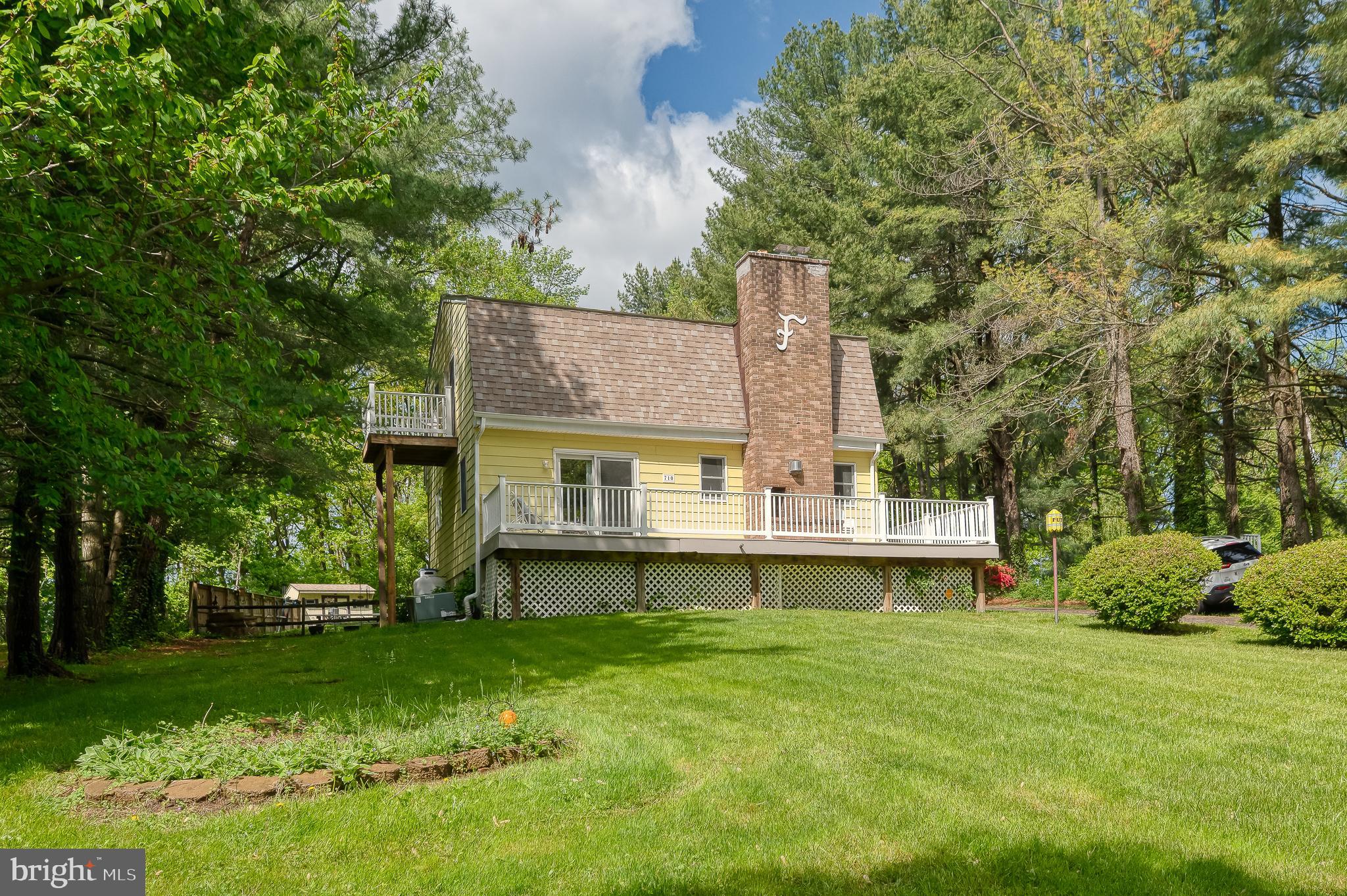 710 Magnolia Road Joppa, MD 21085 - Photo 42 of 58 a view of a house with a big yard and large trees