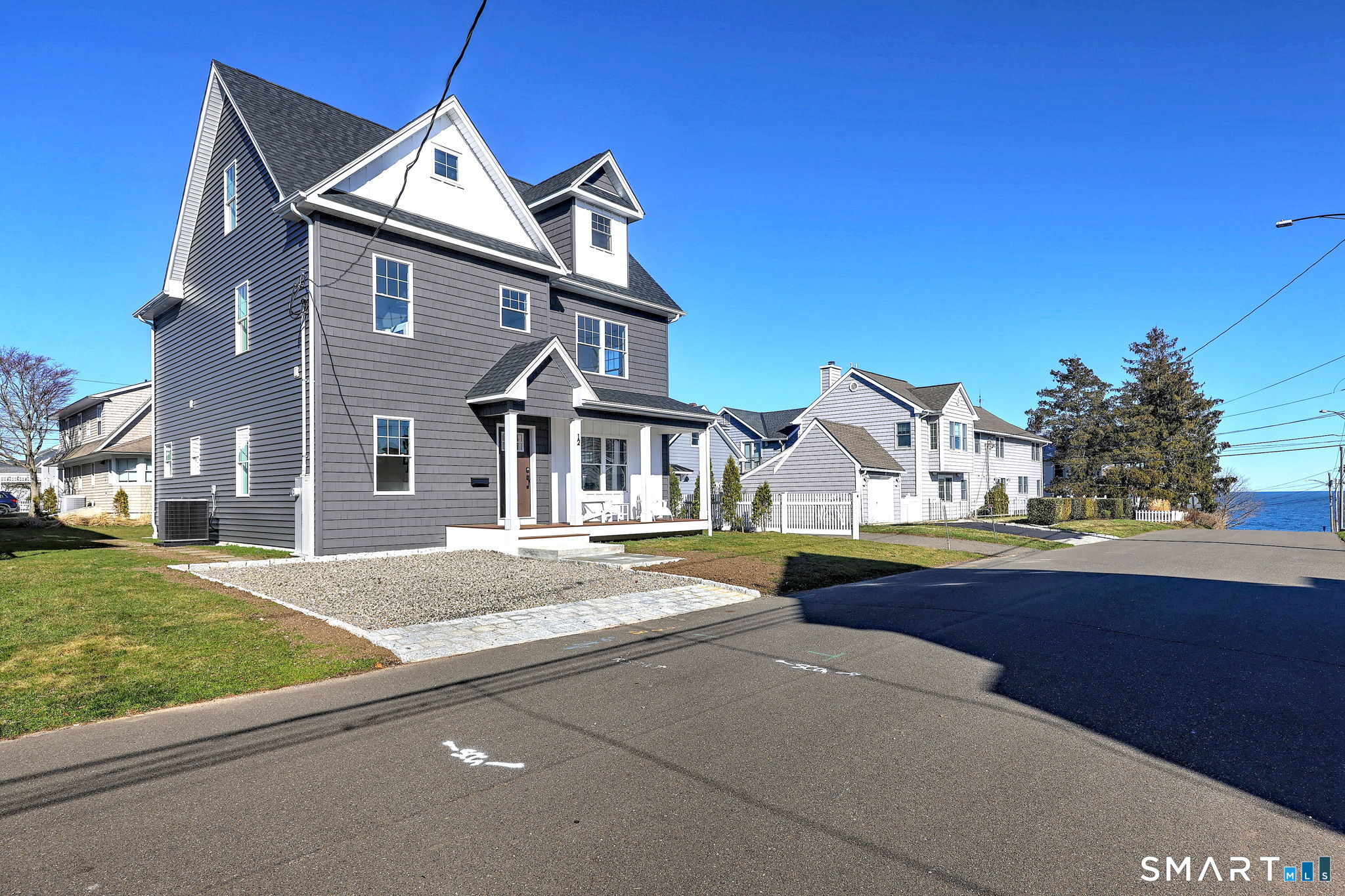 12 Usher Street Milford, CT 06460 - Photo 2 of 46 a front view of a house with a yard