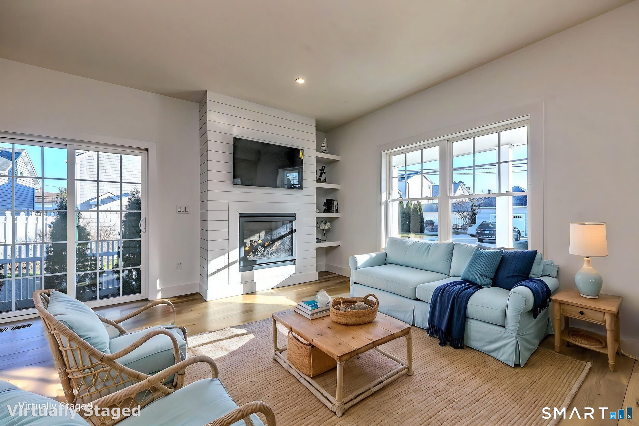 12 Usher Street Milford, CT 06460 - Photo 21 of 46 a living room with furniture a fireplace and a large window