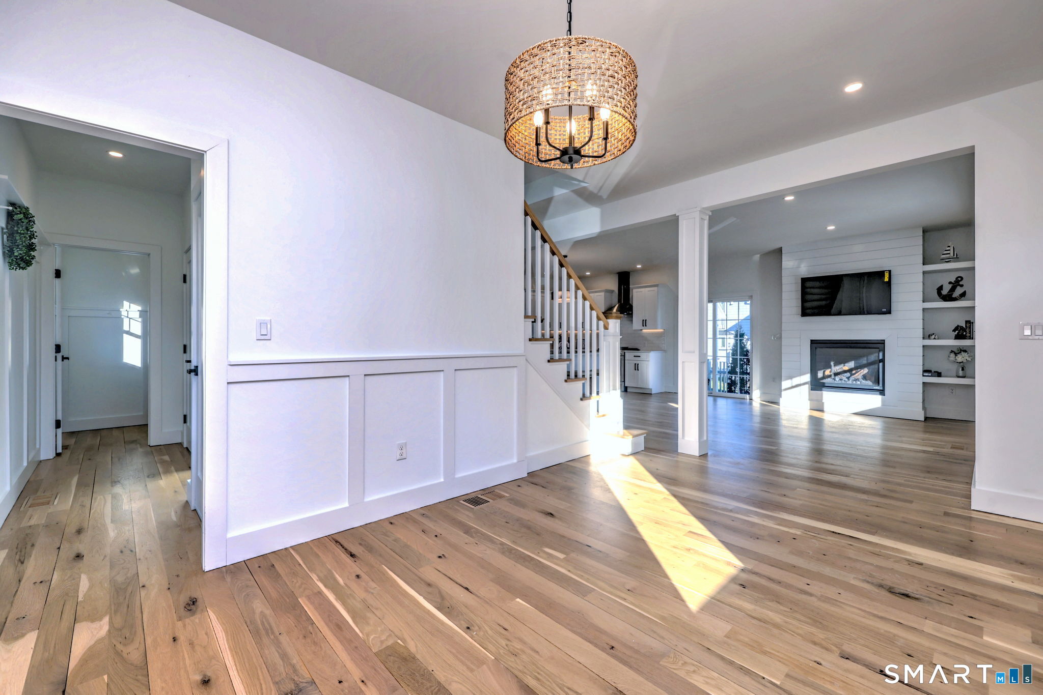 12 Usher Street Milford, CT 06460 - Photo 22 of 46 wooden floor in an empty room with a window
