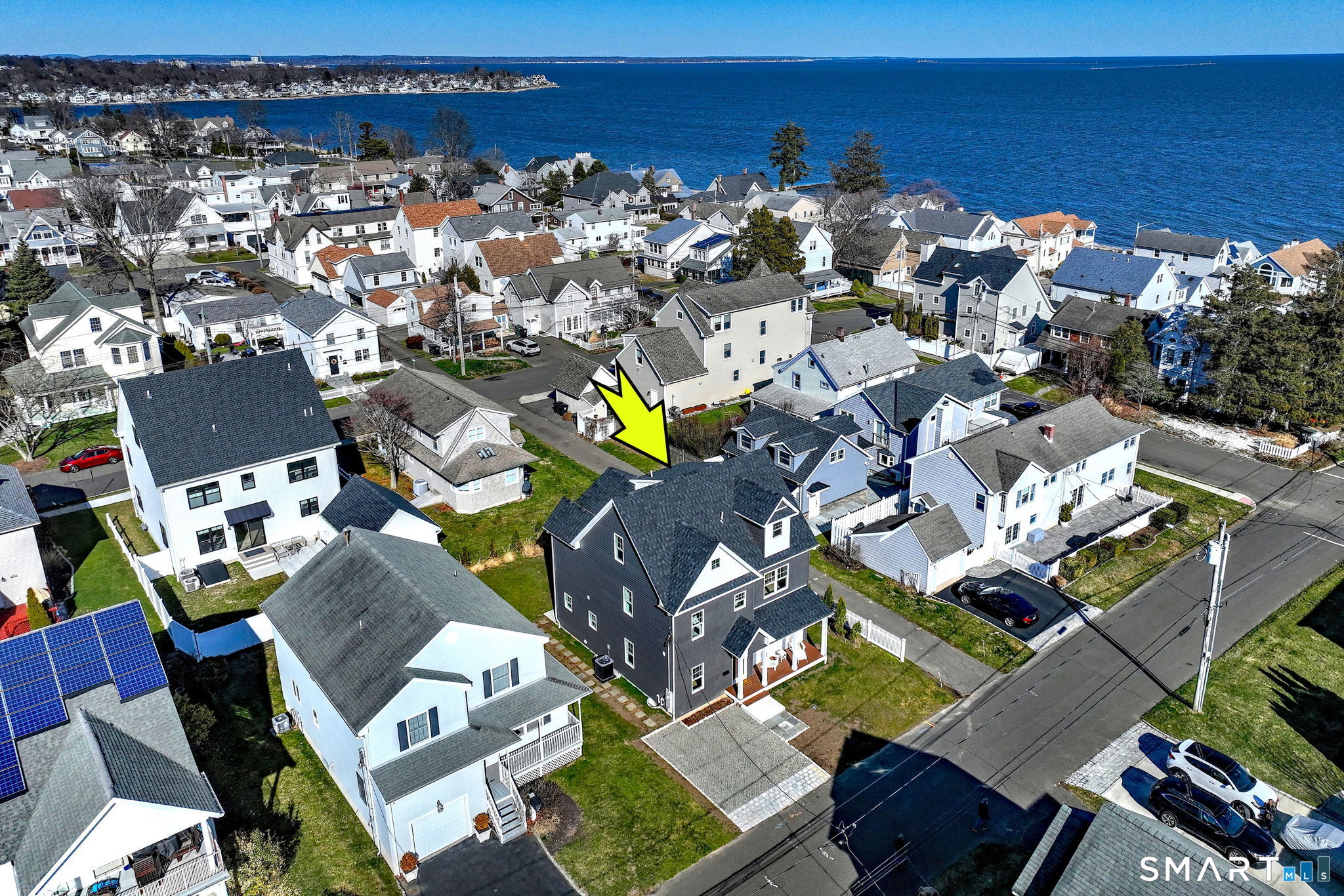 12 Usher Street Milford, CT 06460 - Photo 3 of 46 an aerial view of a houses with city view and ocean view