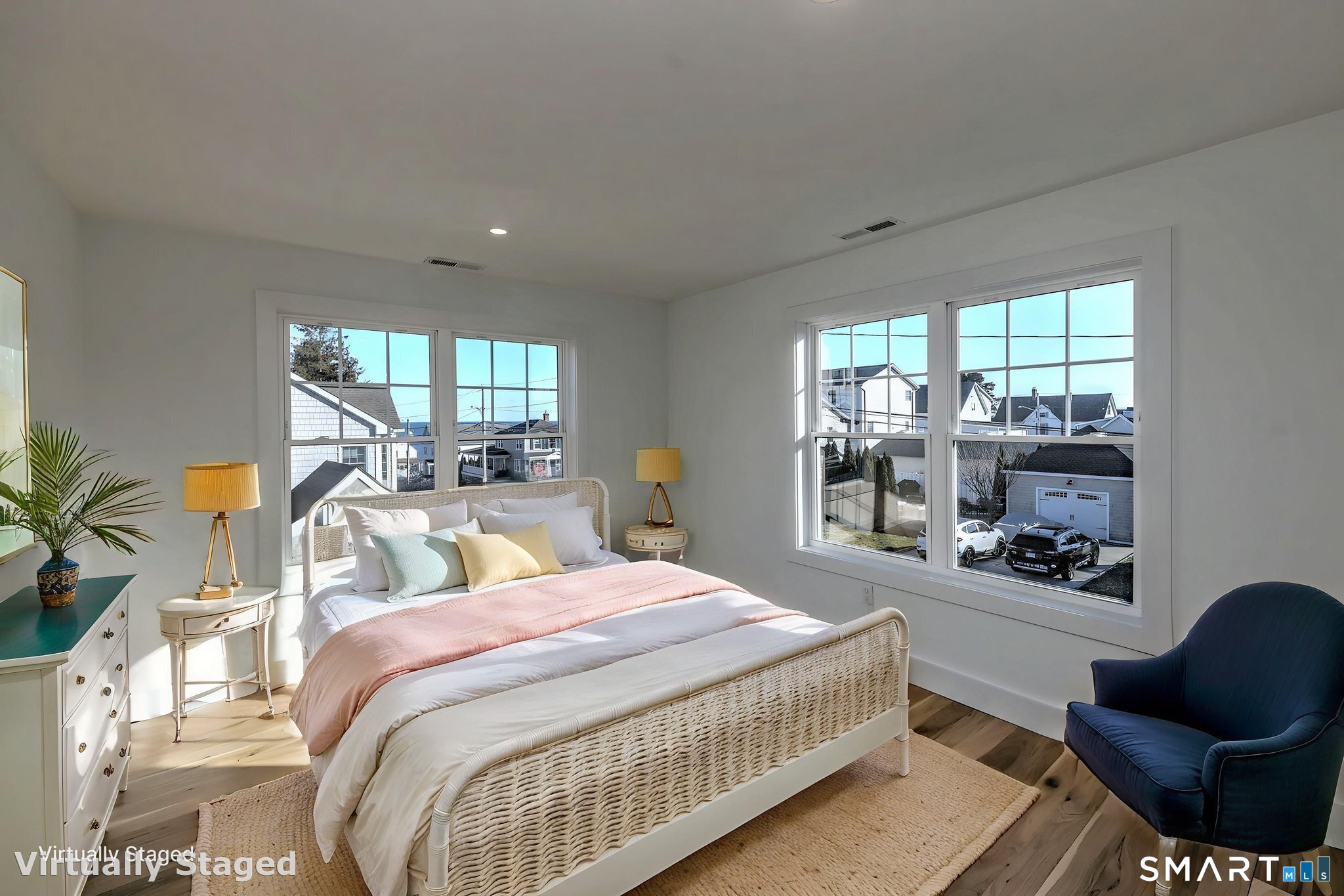 12 Usher Street Milford, CT 06460 - Photo 32 of 46 a bedroom with a bed and a large window