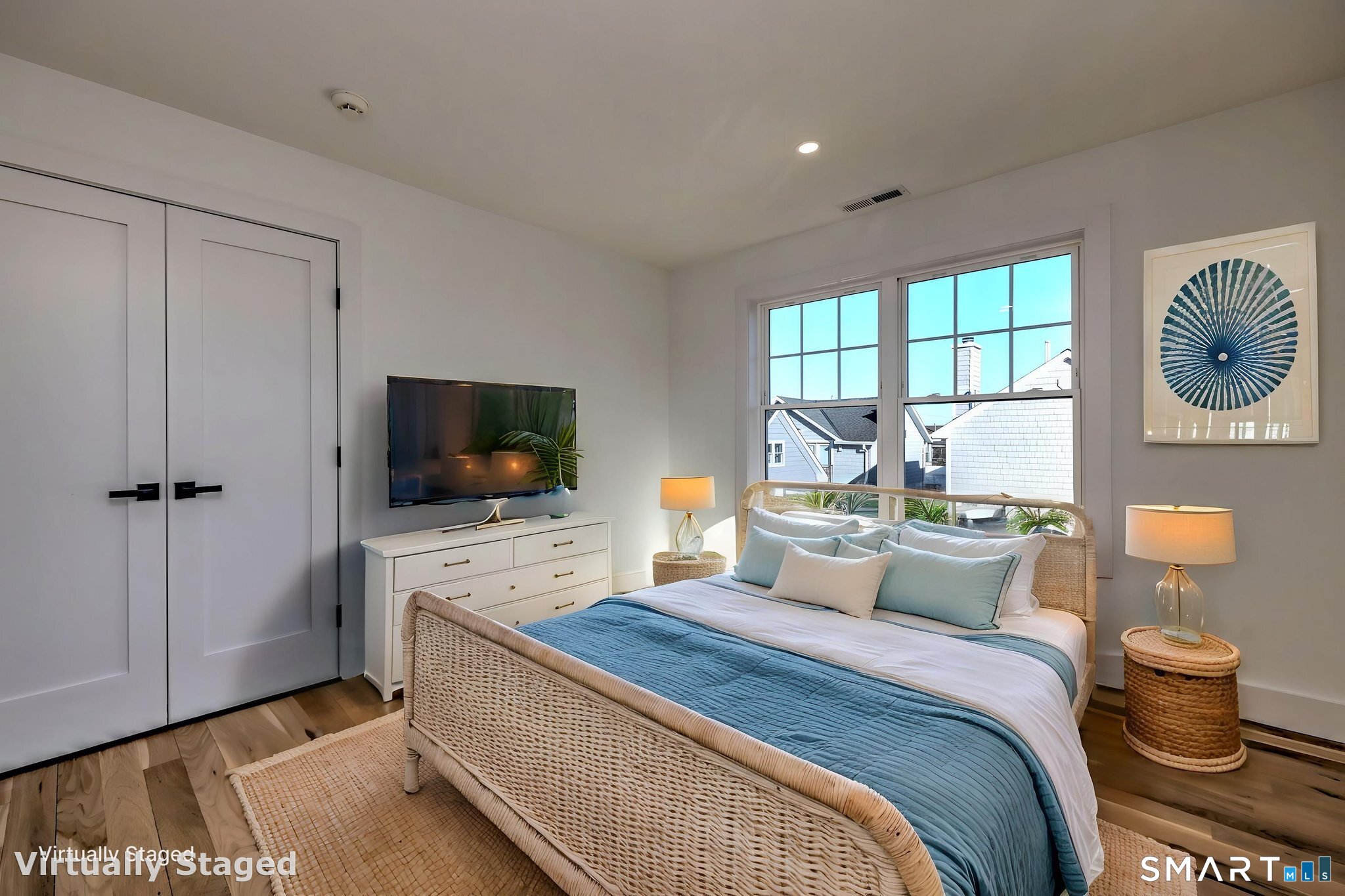 12 Usher Street Milford, CT 06460 - Photo 33 of 46 a bedroom with a bed and a flat screen tv