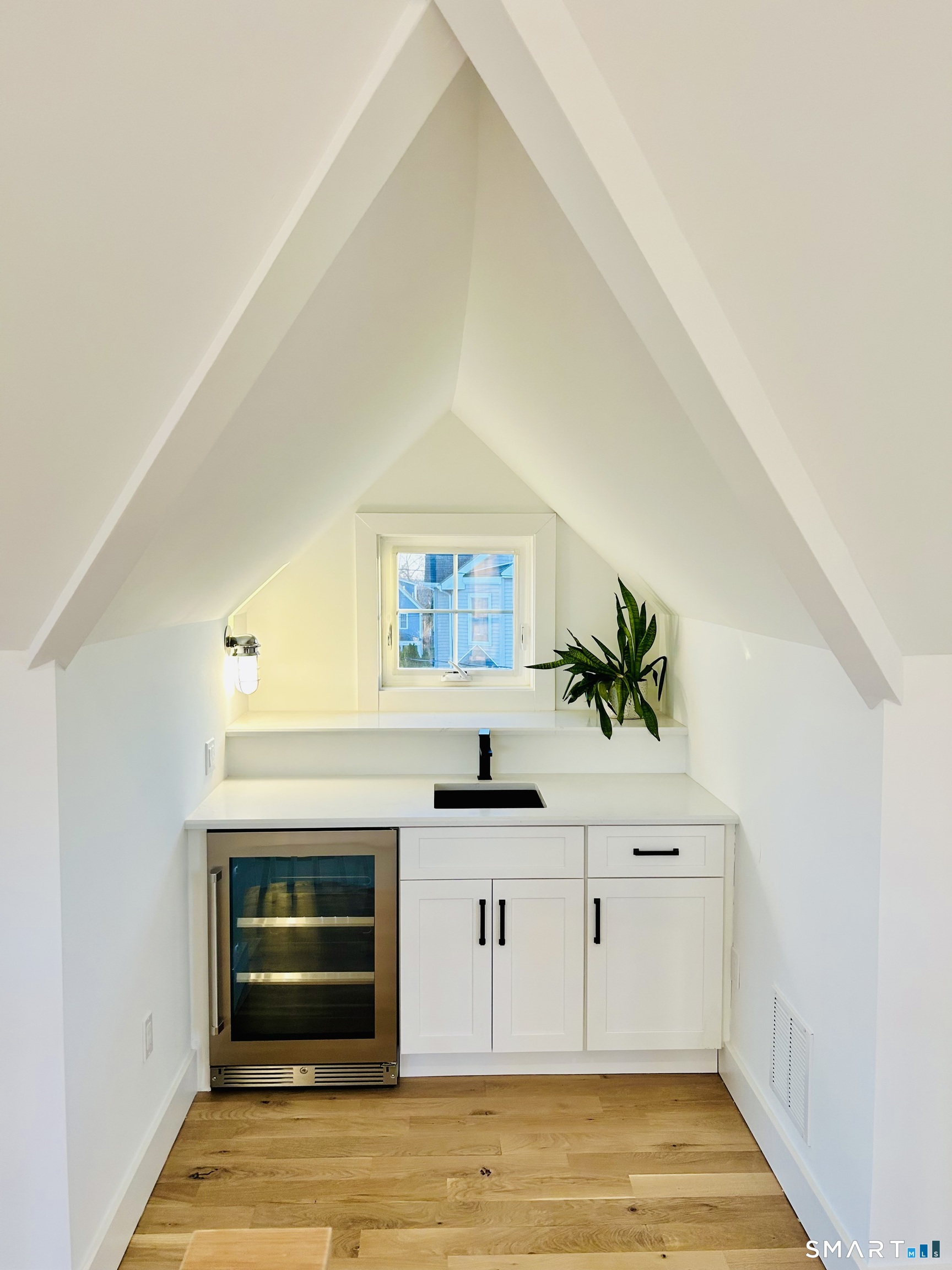 12 Usher Street Milford, CT 06460 - Photo 39 of 46 a kitchen with granite countertop a stove and a sink