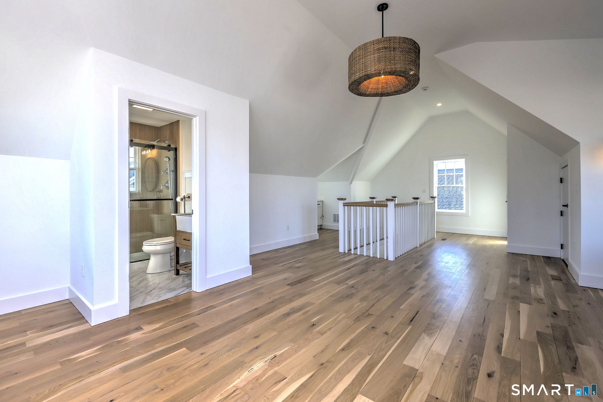 12 Usher Street Milford, CT 06460 - Photo 40 of 46 a view of a room with wooden floor and staircase