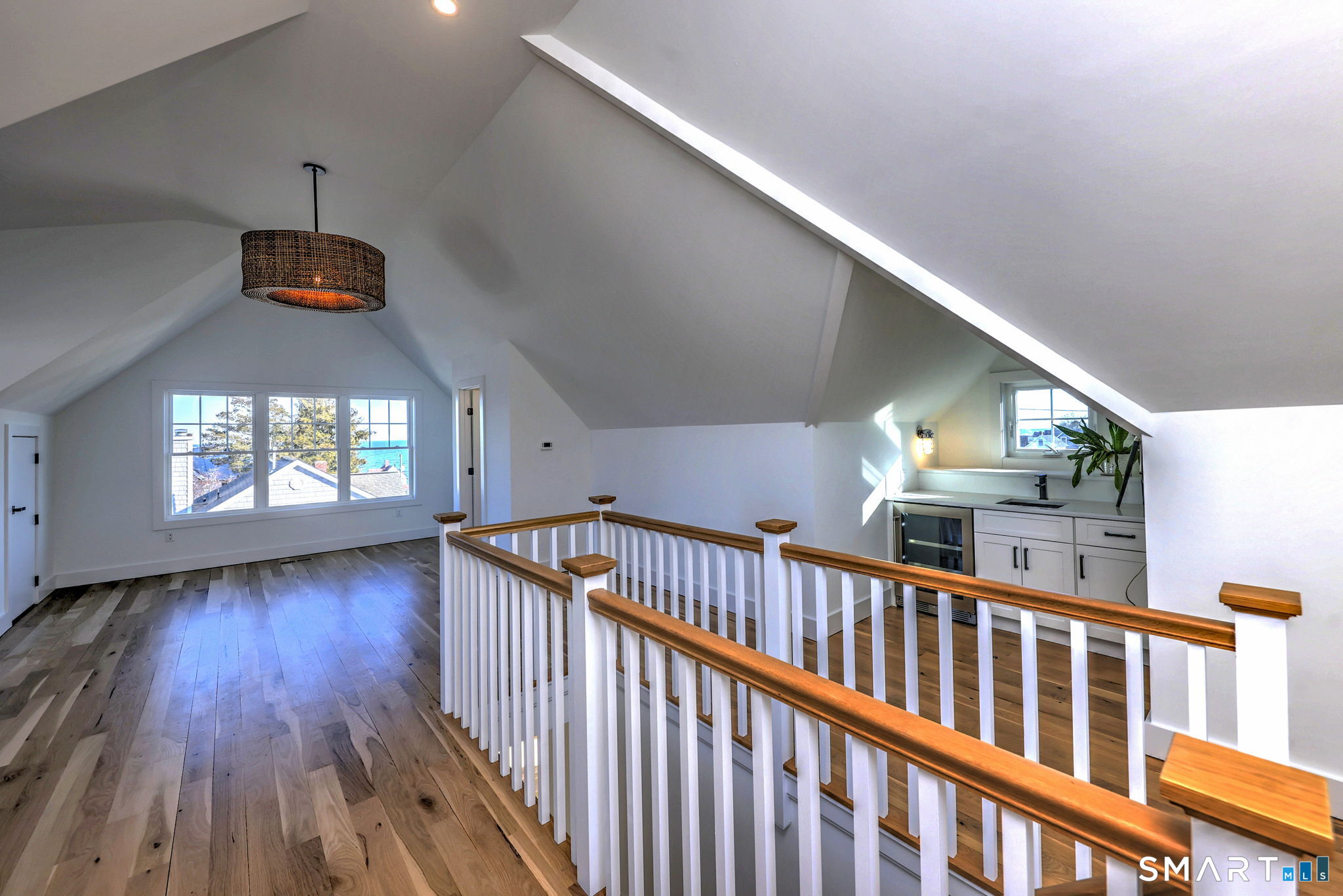 12 Usher Street Milford, CT 06460 - Photo 41 of 46 a view of porch with wooden floor