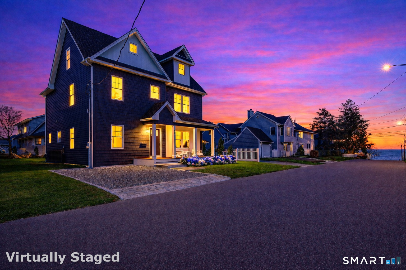 12 Usher Street Milford, CT 06460 - Photo 8 of 46 a view of a building with a street