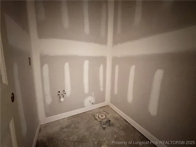 a view of a refrigerator and window in a room