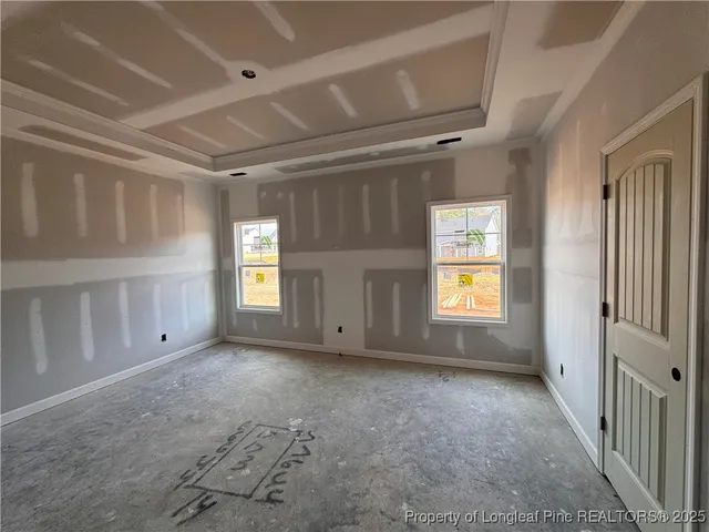 a bathroom with a bathtub and window
