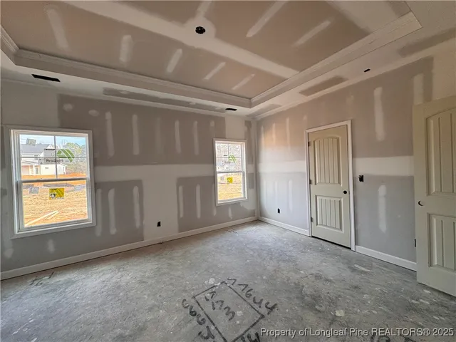 a view of kitchen with sink and refrigerator